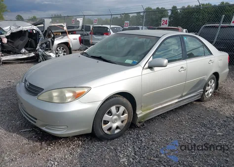 2003 Toyota Camry Le z USA, uszkodzony, nr VIN 4T1BE32K33U739558